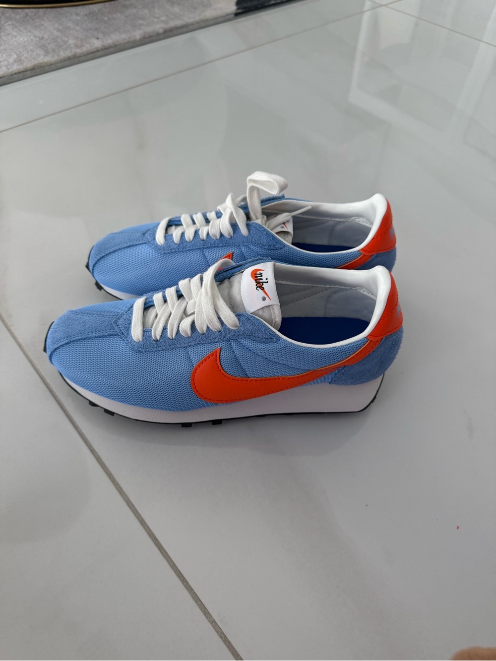 Nike Women’s Runner — Light Blue with Orange Swoosh